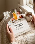 The Cortisol Cocktail Book held in hand — lifestyle