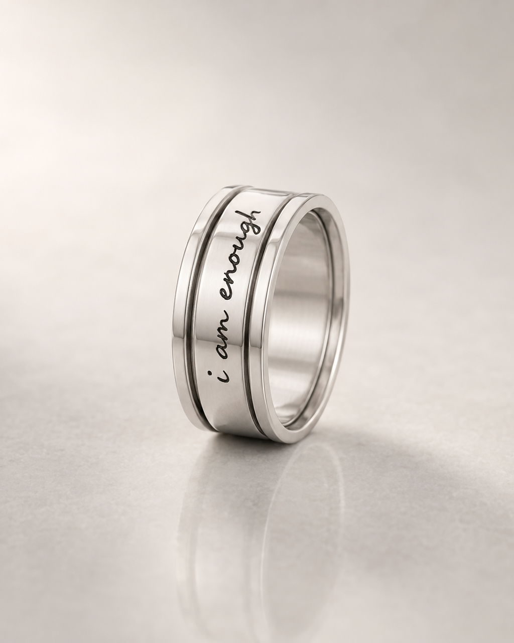 The Calm Ring silver spinner ring engraved i am enough